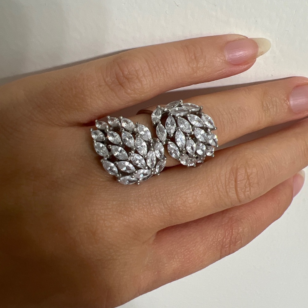 Silver Ring size 6, adjusts to bigger size